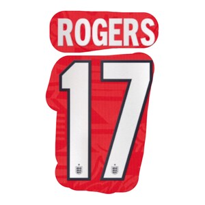May include: A red sports jersey decal featuring the name ROGERS in white block letters above the number 17. The number 17 is white with a dark outline and features a small emblem at the base of each digit. The red background has a subtle pattern.