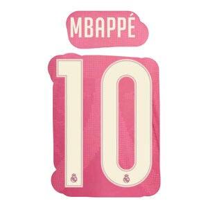 May include: A pink sports jersey graphic featuring the name MBAPPÉ in white capital letters above the large number 10. The number 10 is rendered in a cream color with a thin white outline and includes a small Real Madrid logo at the base.