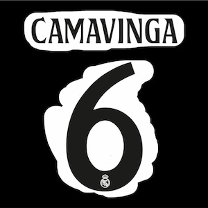 May include: A black and white graphic design. The name "CAMAVINGA" is displayed above the number "6". The number has a white border and a small emblem. The background is solid black.