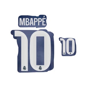 May include: A white and navy blue sports jersey patch set featuring the name "MBAPPÉ" and the number "10". The number "10" is displayed in two sizes, with the Real Madrid logo at the bottom.