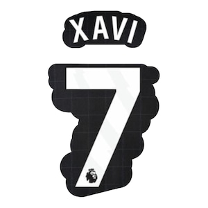 May include: A black and white graphic featuring the name "XAVI" above the number "7". The number is white with a black outline and a Premier League logo at the bottom. The background is a grid pattern.