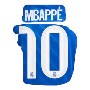 May include: A blue jersey with the name "MBAPPÉ" above a large white number "10". The jersey has a textured pattern and the Real Madrid logo at the bottom of the number.