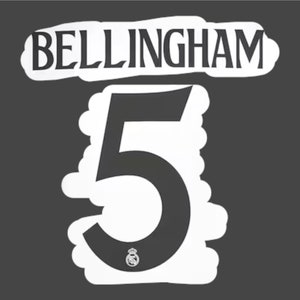 May include: Black and white jersey with the name "BELLINGHAM" and the number "5" on the front. The jersey has a white outline and a small white crest with a crown on the bottom.