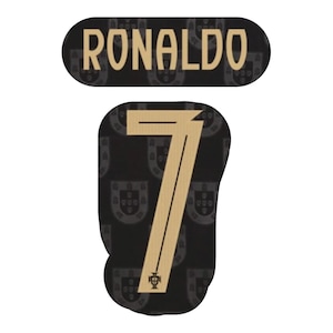 May include: A black rectangular patch with rounded corners featuring the name RONALDO in gold lettering, paired with a separate black patch displaying a large gold number 7, both decorated with a repeating dark grey Portugal crest pattern.