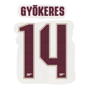 May include: A white sticker featuring the name "GYÖKERES" in maroon block letters above the number "14". The number is maroon with a textured pattern and a gold outline. A small logo is at the bottom of the number.