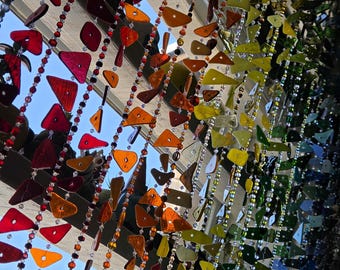 Stained glass and beaded curtain each strand is unique & colorful. For any window fully customizable - length and colors available