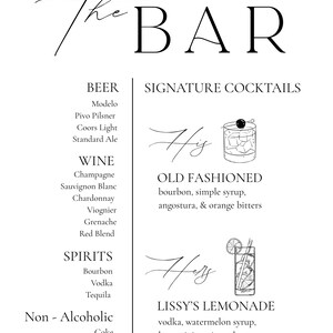 May include: A black and white bar menu sign with the words "The BAR" in elegant script. The menu lists beer, wine, spirits, and non-alcoholic beverages, along with signature cocktails like the Old Fashioned and Lissy's Lemonade.