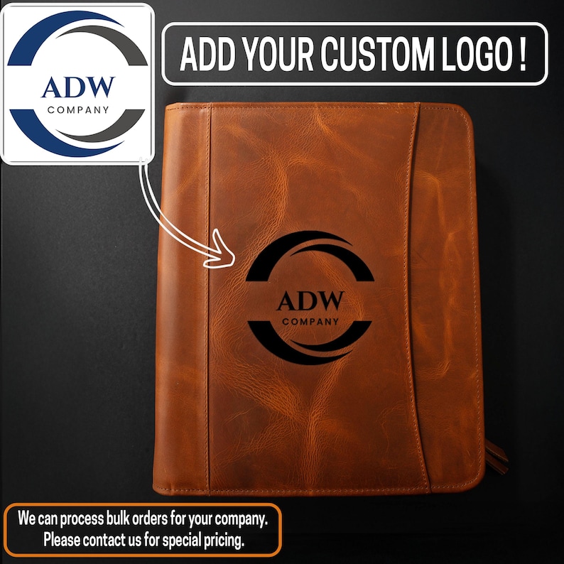 May include: A brown leather portfolio with a custom logo. The text "ADD YOUR CUSTOM LOGO!" is at the top. The logo is a black semi-circle with the text "ADW COMPANY" inside. The portfolio has a zipper closure.