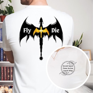 May include: White t-shirt with a black dragon graphic on the back. The dragon has gold accents and the text "Fly or Die" on its wings. The front of the shirt has a small black and white graphic with the text "Second Squad Flame Section Fourth Wing".