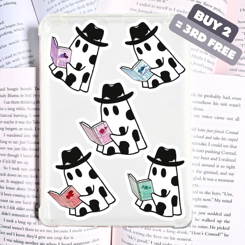 May include: A set of five white ghost stickers with black spots, each wearing a black hat and reading a book. The books have different colored covers. The stickers are on a clear phone case. Text on the image says "BUY 2 = 3RD FREE".