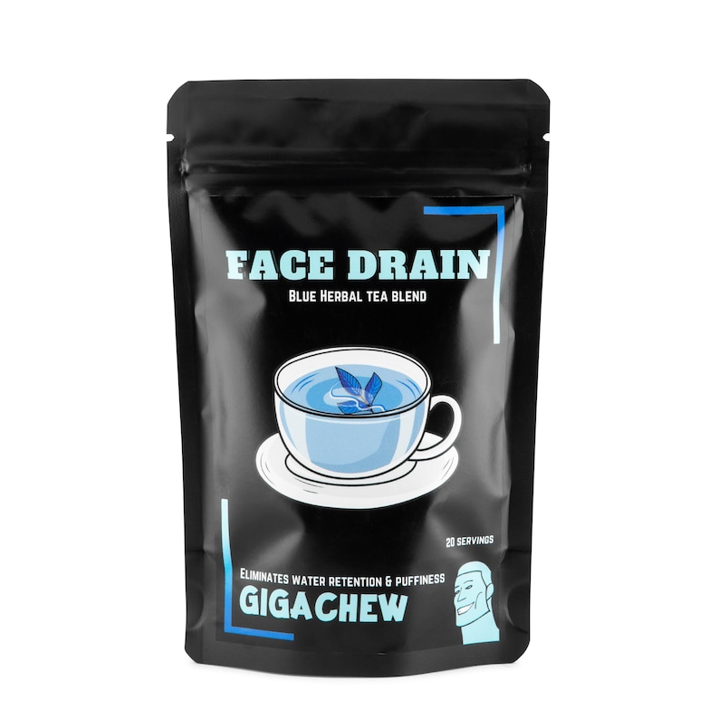May include: A black pouch with a white label that says "FACE DRAIN BLUE HERBAL TEA BLEND". The label also features a cartoon illustration of a cup of blue tea with a flower floating in it. The pouch has a white label at the bottom that says "ELIMINATES WATER RETENTION & PUFFINESS GIGACHEW" and a cartoon illustration of a person's face. The pouch has a white label at the top that says "20 SERVINGS".