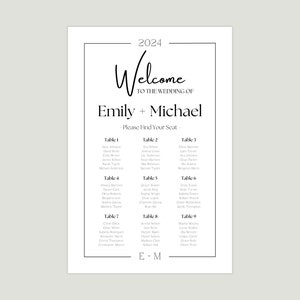 May include: A black and white wedding seating chart with the text "Welcome to the wedding of Emily + Michael" and "Please find your seat". The chart lists the names of guests assigned to each table number.