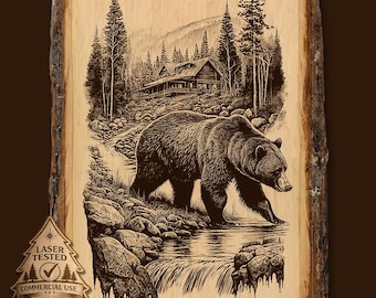 May include: A wood-burned art piece featuring a detailed depiction of a bear walking through a stream in a forest. A cabin is visible in the background. The artwork is on a piece of wood with a natural edge. The text "LASER TESTED COMMERCIAL USE" is visible.