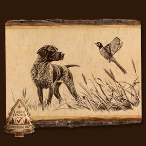 May include: A laser-etched wooden plaque featuring a hunting dog and a pheasant in a field of tall grass. The dog is brown and white, with the pheasant in mid-flight. The plaque has a natural wood edge and a "Laser Tested Commercial Use" logo.