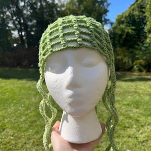 green jellyfish hat