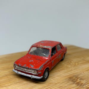 Miniature Fiat 124 Berline - Mercury - Échelle 1/43 - Rouge - Occasion