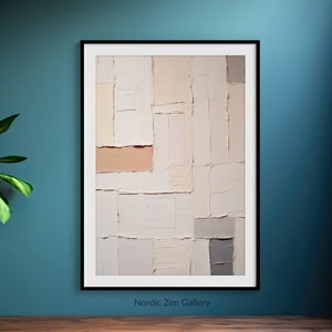 Puede incluir: Impresión de arte abstracto con fondo blanco y formas geométricas beige y grises. La impresión está enmarcada en negro y está colgada en una pared azul verdosa. El texto "Nordic Zen Gallery" está debajo de la impresión.