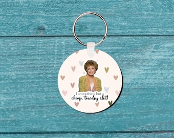 Golden Girls Blanche Devereaux nyckelring "Jag är inget annat än en billig, prålig slyna"