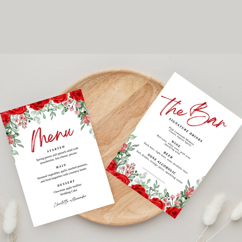 May include: A wedding menu and bar menu with a floral design featuring red roses and green leaves. The menu lists the food and drinks that will be served at the wedding reception. The text on the menu reads "Menu", "Started", "Spring greens and spinach salad with strawberries, feta cheese, pecans", "Main", "Steamed vegetables, garlic mashed potatoes, and fresh baguettes with creamery butter", "Dessert", "Chocolate apple muffins", "Wedding Cake", "Charlotte + Alexander", "The Bar", "Signature Drinks", "Pink Lemonade Mimosa", "Classic Aperol Spritz", "Wine", "Red wine, white wine, pink wine", "sparkling wine", "Beer", "Dark beer, light beer, none alcoholic beer", "None Alcoholic", "Soft drinks, orange juice, sparkling water".