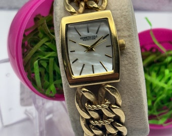 Vintage Kenneth Cole Reaction Ladies Gold Cocktail formal Quartz Watch intregrated Bracelet ex running Condition Mother pearl dial