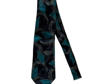 Corbata vintage Daniel Craig 100% seda con estampado abstracto, fabricada en Italia, color negro y turquesa