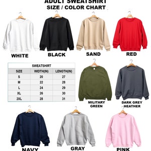 May include: Adult sweatshirt size and color chart with 11 different color options. The chart includes measurements for width and length in inches for sizes S, M, L, XL, and 2XL.
