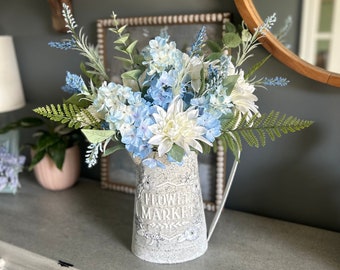 Rustic floral watering can