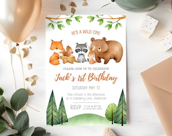 May include: A woodland-themed first birthday party invitation with a cute illustration of a fox, raccoon, bunny, and bear. The invitation reads "He's a Wild One" and "Jack's 1st Birthday".