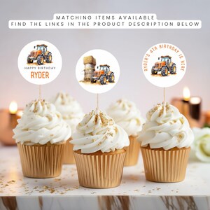 May include: Three gold cupcake liners with white frosting and gold sprinkles. Each cupcake has a round, white sticker with a tractor and text that reads "Happy Birthday Ryder" and "Ryder's 4th Birthday is Here".