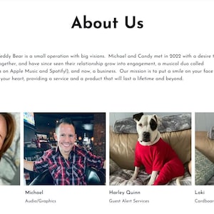 May include: A group photo of four people, two women and two men, with their dogs. The women are wearing casual clothing, and the men are wearing plaid shirts. The dogs are wearing red and blue shirts. The text "About Us" is at the top of the image.