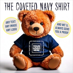 May include: A plush brown teddy bear wearing a navy blue t-shirt. The shirt features a white square with the text "YOUR LOGO HERE" and the words "YOUR IMAGE", "YOUR TEXT", "YOUR PICTURE", and "YOUR LOGO" around it. The text "THE COVETED NAVY SHIRT" is above the bear.