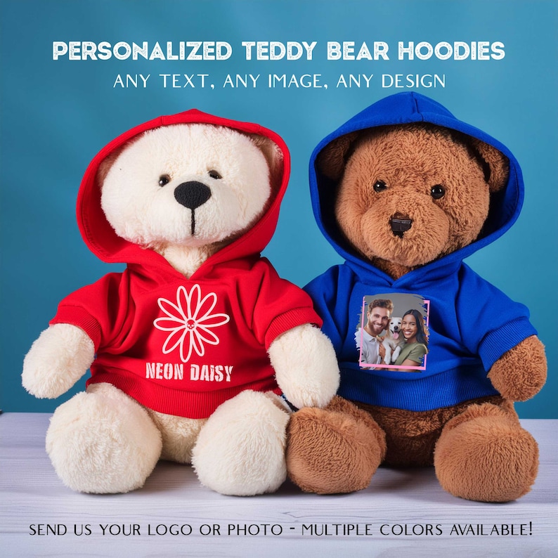 May include: Two plush teddy bears wearing personalized hoodies. One bear is white with a red hoodie featuring a daisy and the text "NEON DAISY". The other bear is brown with a blue hoodie featuring a photo of a couple and a dog.