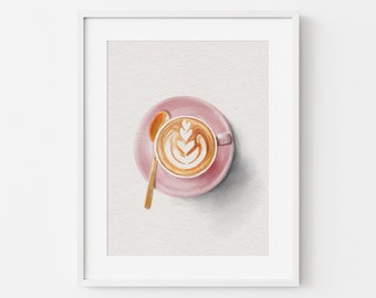 May include: Watercolor painting of a coffee cup with latte art, resting on a pink saucer. A gold spoon is placed to the side. The artwork is framed in a white border, creating a clean and modern aesthetic.