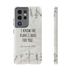 May include: A white phone case with a floral design and the text "I know the plans I have for you. Jeremiah 29:11"