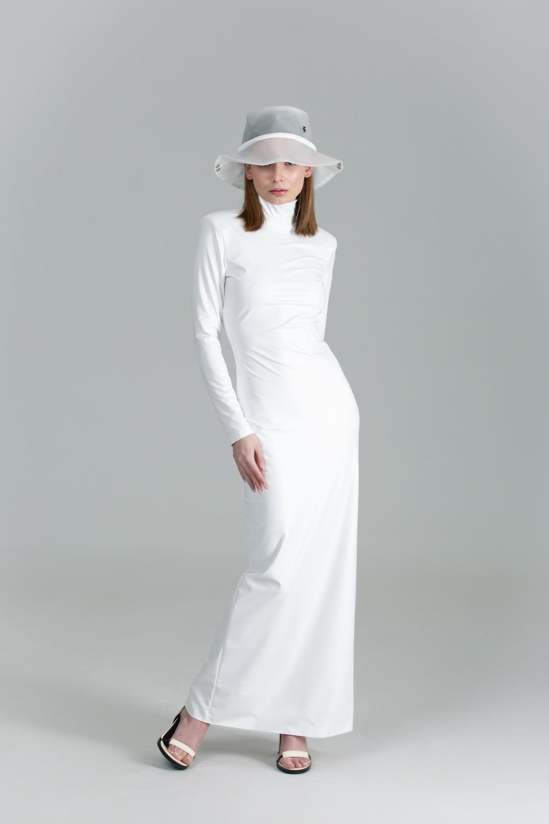 faux leather pencil dress Ivory embossed croc skirt BU Club The asymmetric neckline and hemline create visual interest while the strategic ruching across the midsection sculpts and flatters your silhouette White Faux Leather Pencil Dress
