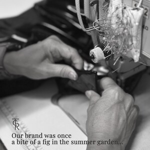 May include: Black and white photo of a person's hands working on a sewing machine. The text reads "Our brand was once a bite of a fig in the summer garden... And to this day, we handcraft each garment at the atelier under the fig trees."