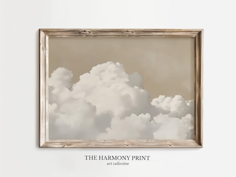 May include: A framed print of a beige and white cloudy sky. The print is titled "The Harmony Print" and is by the art collective.