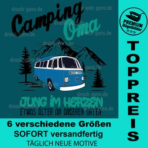 May include: A blue and white camper van with mountains and trees in the background. The text "Camping Oma" is at the top of the image. The text "Jung im Herzen, etwas älter an anderen Orten" is below the van. The text "6 verschiedene Größen, SOFORT versandfertig, TÄGLICH NEUE MOTIVE" is at the bottom of the image.
