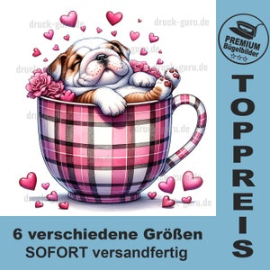 以下が含まれることがあります： ピンクと白のチェック柄のティーカップの中に、寝ているブルドッグの赤ちゃんが入っています。ティーカップには持ち手があり、ピンクのハートで囲まれています。