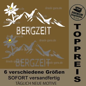 Peut inclure: Un fond brun avec une chaîne de montagnes blanche et une fleur d'edelweiss blanche. Le texte "BERGZEIT" est écrit en blanc avec un aspect vieilli. Le texte "TOPPREIS" est écrit en noir avec un aspect vieilli. Le texte "6 verschiedene Größen SOFORT versandfertig TÄGLICH NEUE MOTIVE" est écrit en blanc.