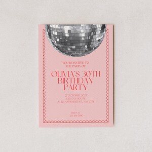 May include: A pink invitation with a red border and a silver disco ball at the top. The text reads "You're invited to the party of Olivia's 30th Birthday Party" and includes the date, location, and RSVP information.