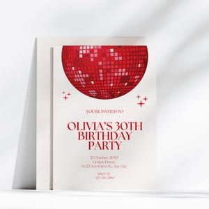May include: Red and white disco ball birthday party invitation with the text "You're invited to Olivia's 30th Birthday Party" and details for the party.