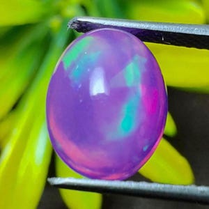 AAA Quality Natural Ethiopian Opal Purple Opal Gemstone With neon Fire Play, Oval Cabochon for Custom jewelry Design or Vibrant Loose Opal.