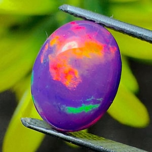 Top Quality Natural Ethiopian Opal Purple Opal Gemstone With neon Fire Play, Oval Cabochon for Custom jewelry Design or Vibrant Loose Opal.