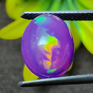 Top Quality Natural Ethiopian Opal Purple Opal Gemstone With neon Fire Play, Oval Cabochon for Custom jewelry Design or Vibrant Loose Opal.