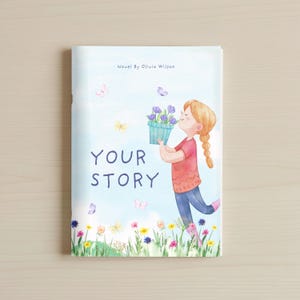 May include: Book cover illustration featuring a young girl with red hair and a braid, holding a turquoise pot of purple flowers. The title "YOUR STORY" is displayed in large letters, with butterflies and flowers scattered around.