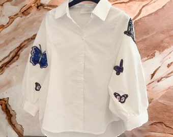 Nouveau design printemps/été pour femme, chemise blanche, broderie papillon, chemisier ample à manches trois-quarts et chemise boutonnée