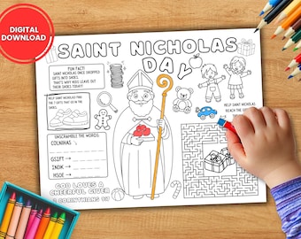 May include: A black and white Saint Nicholas Day coloring page with the text "Saint Nicholas Day" and various illustrations. A child's hand is coloring the maze with a red crayon. A box of crayons is in the lower left corner.