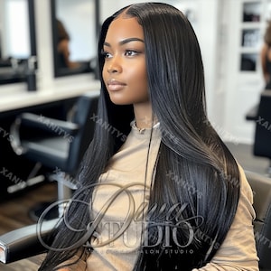 May include: A woman with long, straight black hair styled in a middle part. She is wearing a light brown shirt with the text "Diva Studio" printed on it.