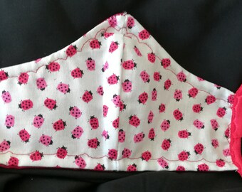 KID Red Lady Bugs on White. Fits most KIDS. cotton. Fold Over elastic ear holder. Made in Oregon, washable. reusable